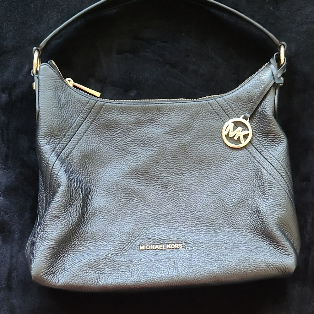 Michael Kors Black Hobo Bag with Gold Accents